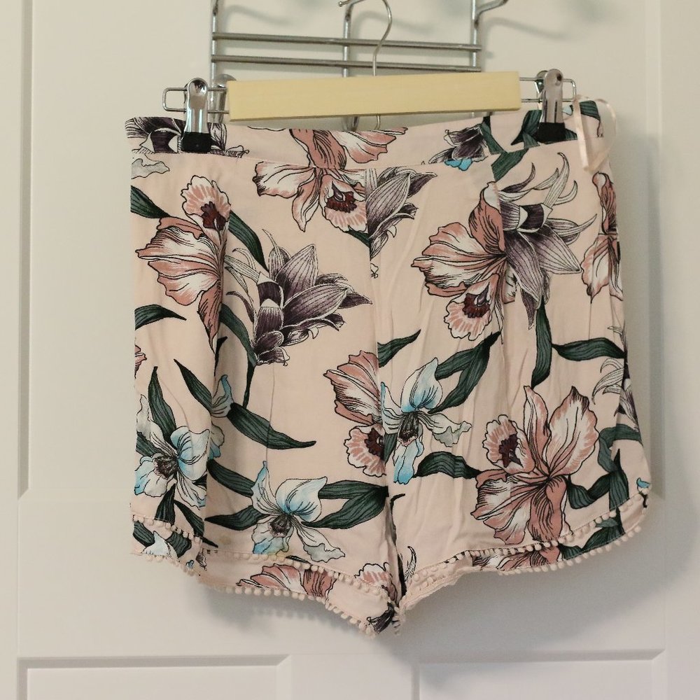 pink floral shorts with pom pom hem